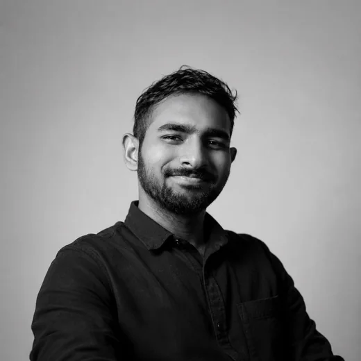 A black and white studio portrait